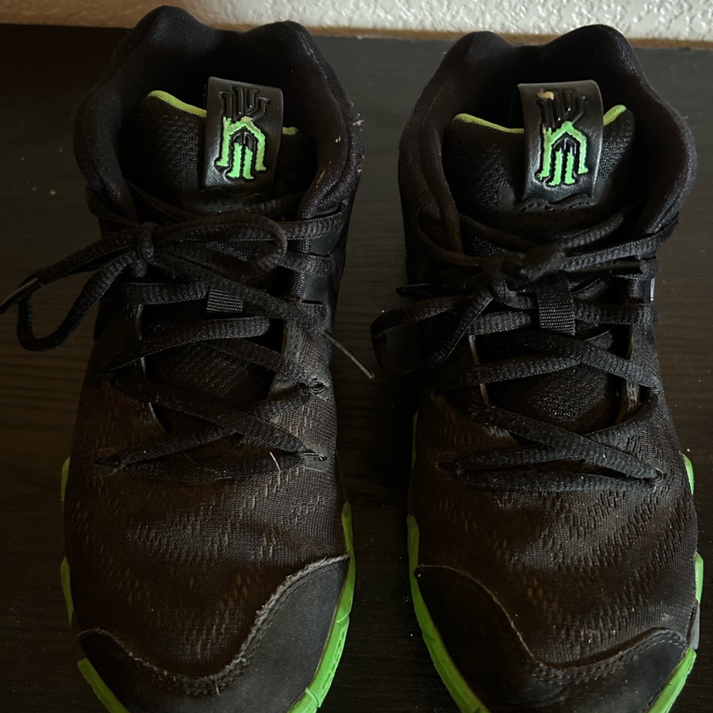 Nike Black and Green Athletic Shoes with Mesh Upper